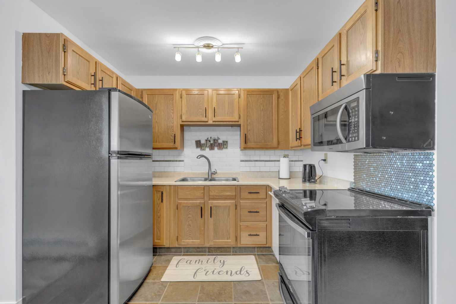 Property Photo:  7031 Gray Drive 302  AB T4P 2B1 