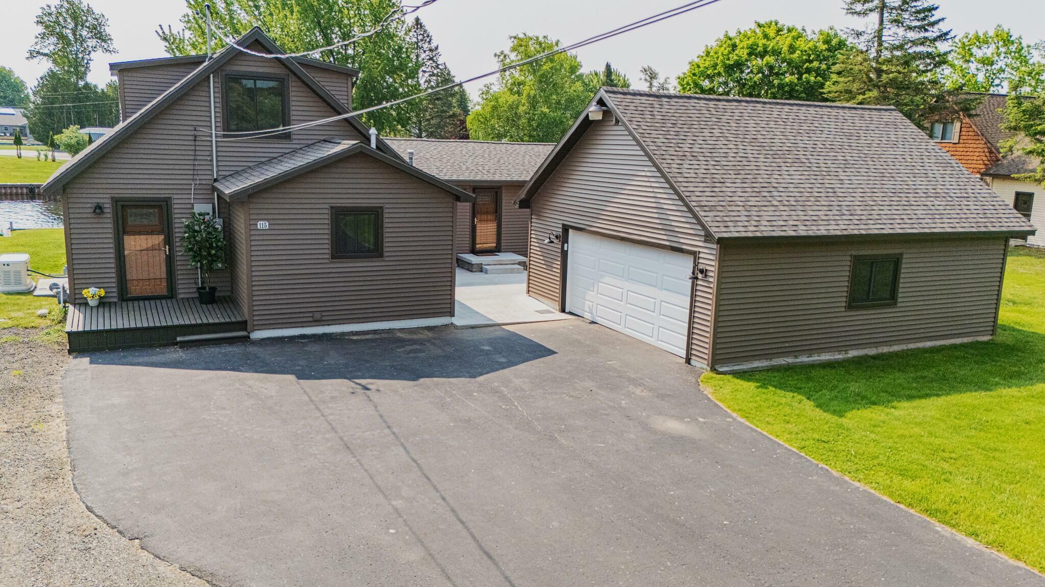 Property Photo:  115 Choctaw Trail  MI 48651 