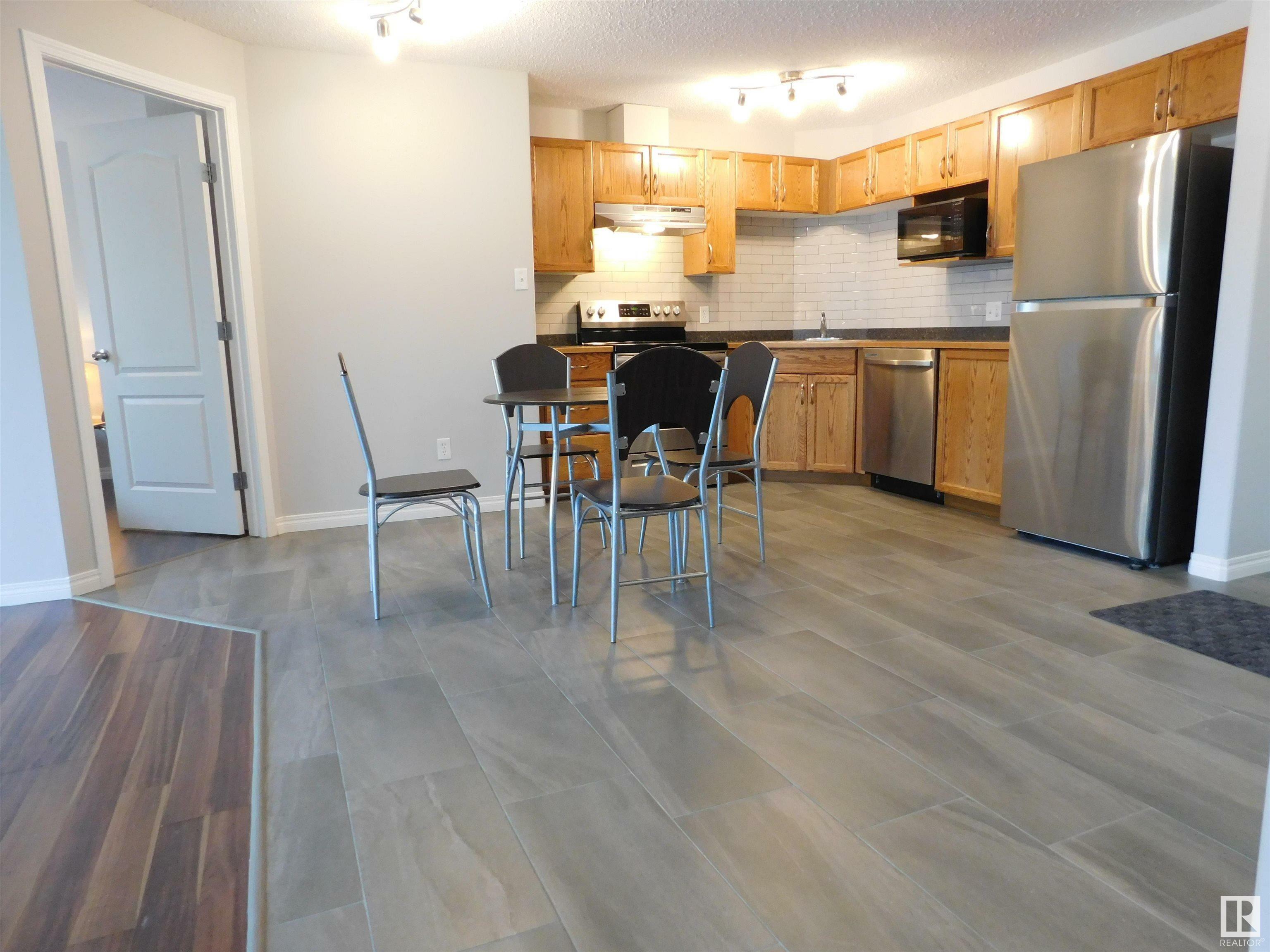 Property Photo: 5340 199 Street NW 225 AB T6M 0A6