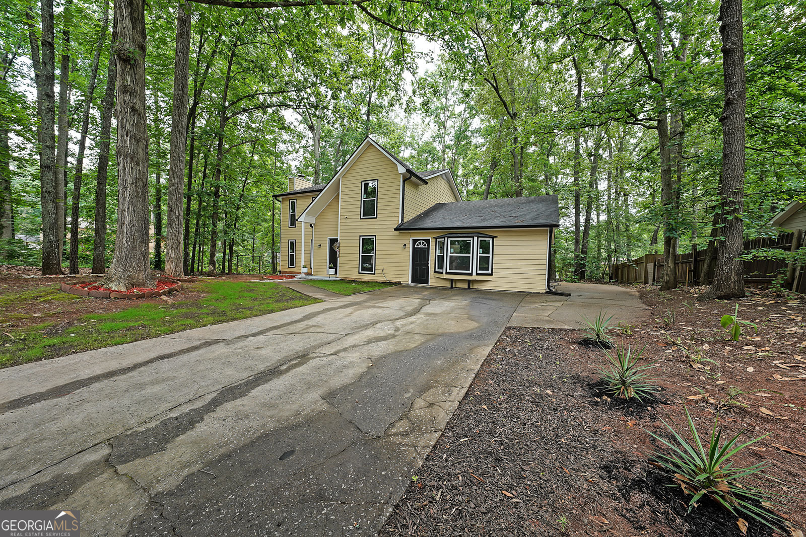 Property Photo: 7156 Whitfield Drive GA 30296