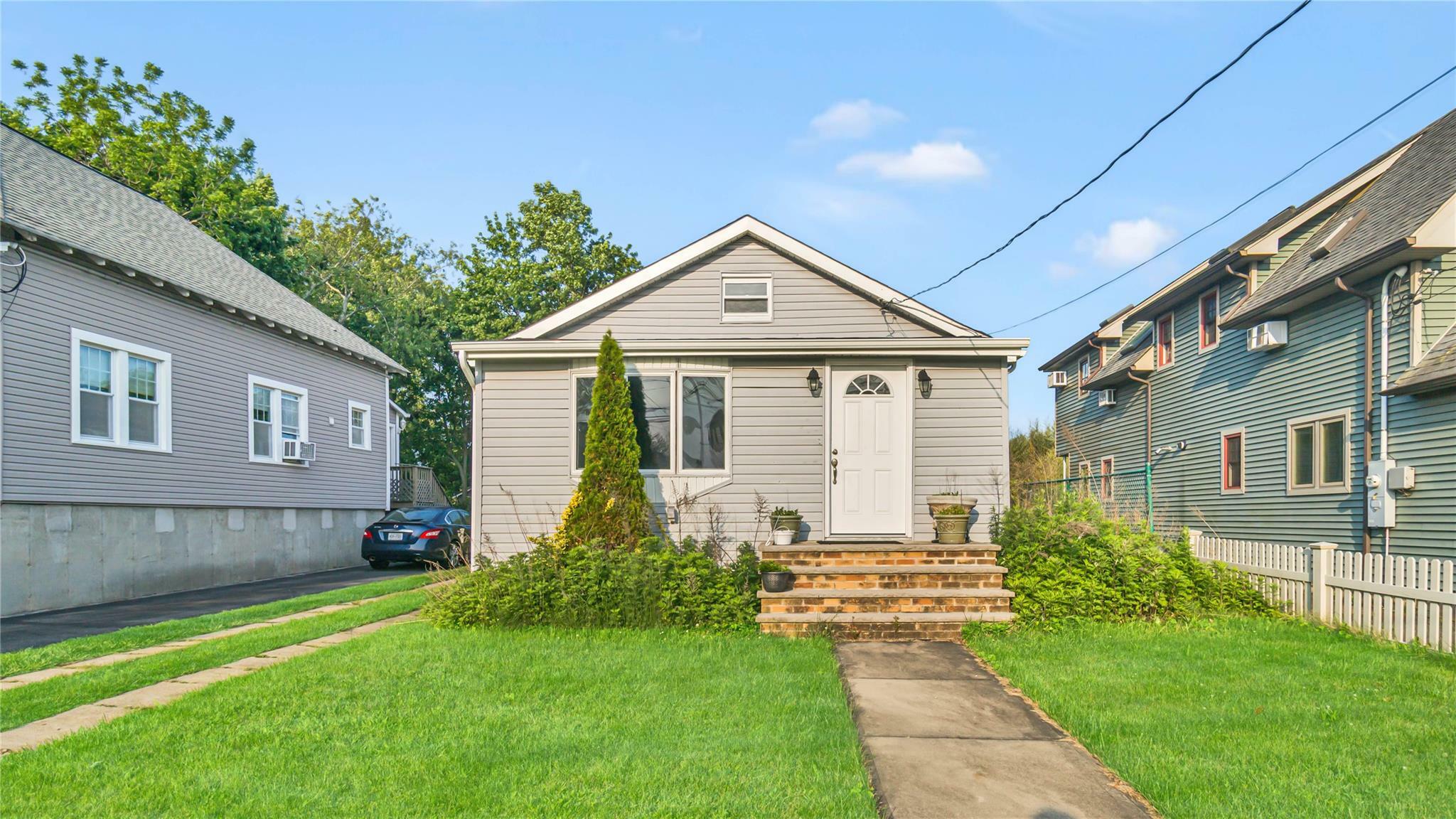 Property Photo: 9 E Hamilton Avenue NY 11758