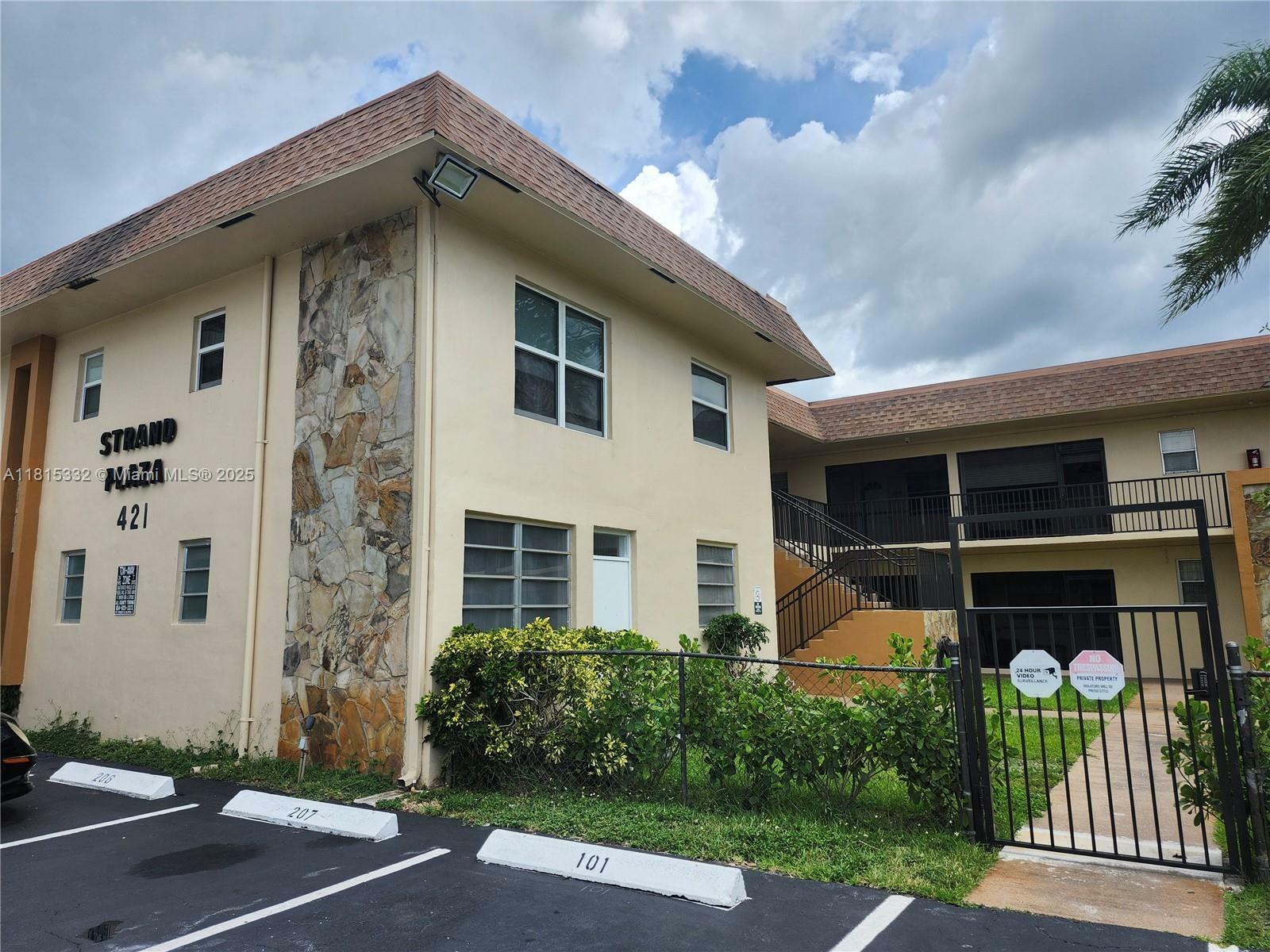 Property Photo: 421 NE 1st St 214 FL 33009