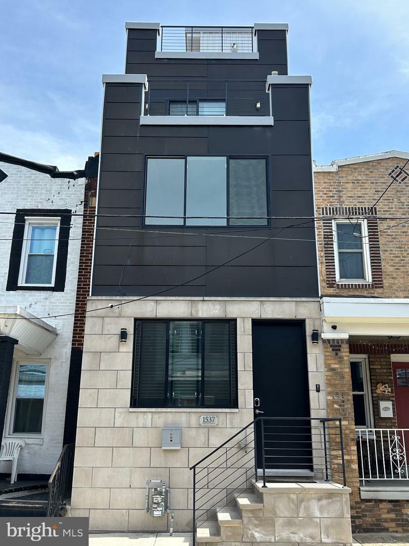 Property Photo: 1537 S Napa Street PA 19146