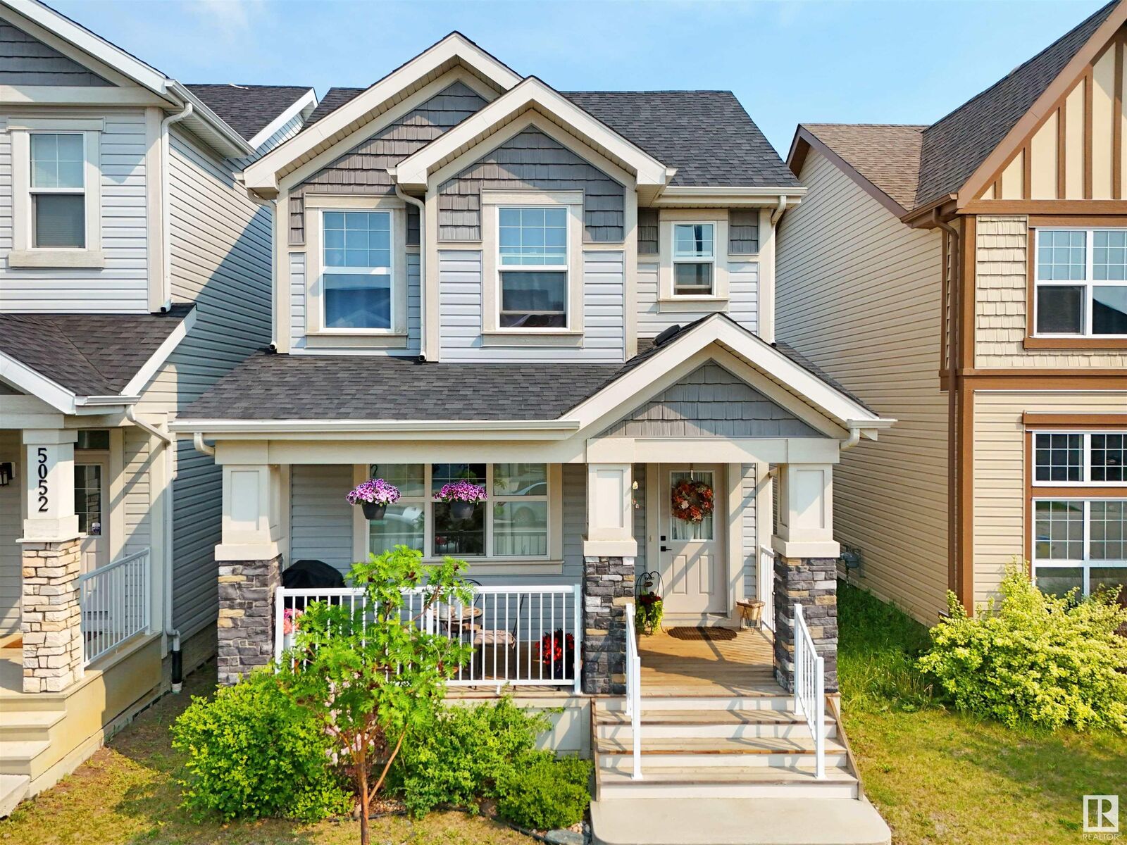 Property Photo: 5050 Andison Close SW AB T6W 3T4