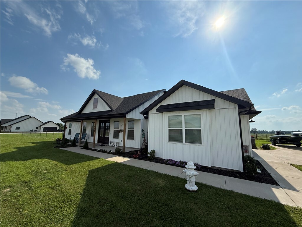 Property Photo:  600 Madison 7353  AR 72738 