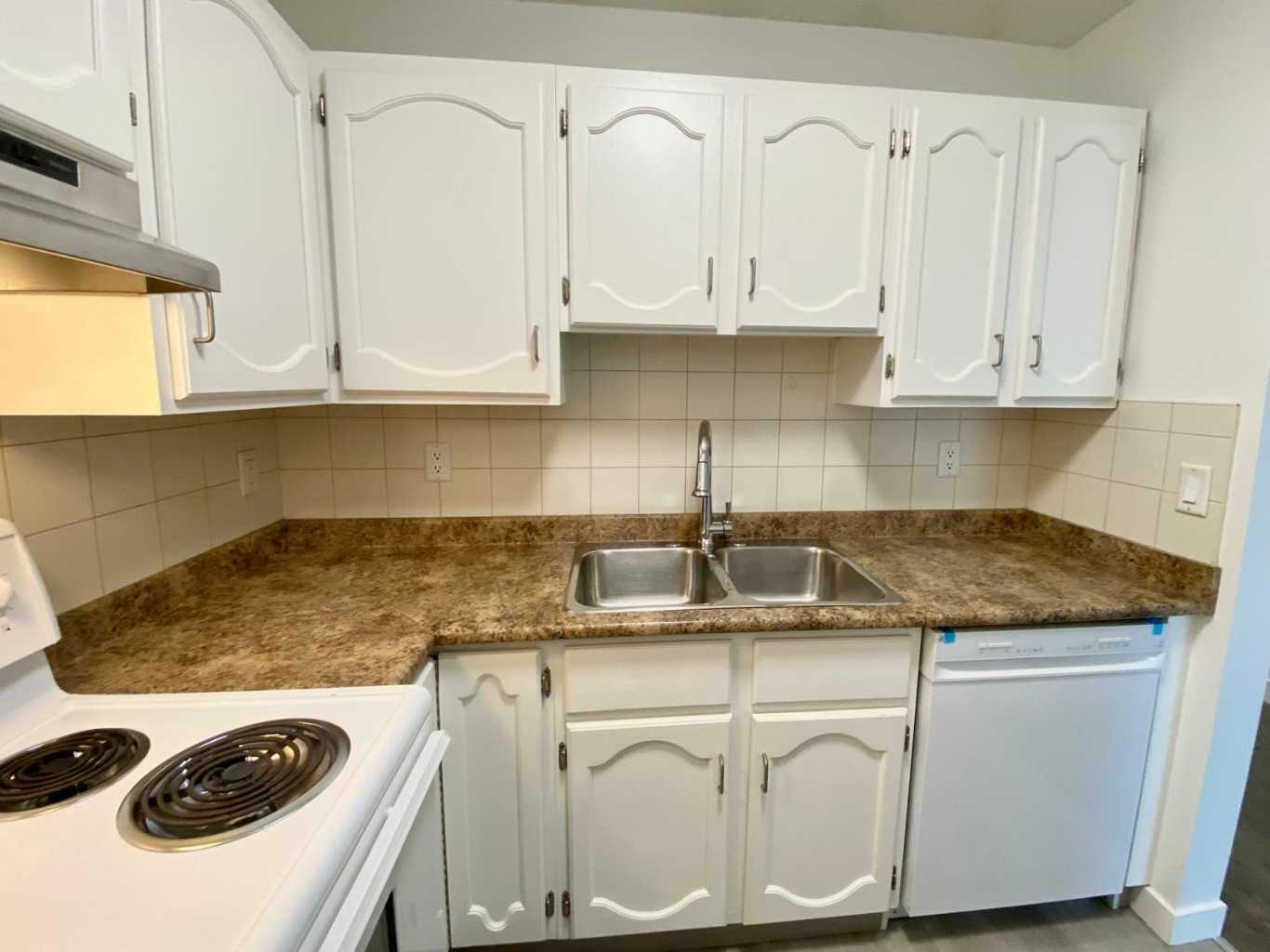 Property Photo: 611 67 Avenue SW 302 AB T2V 0M3