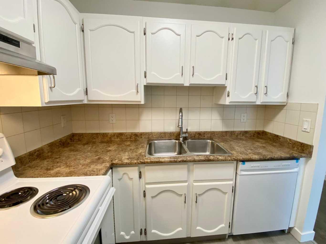 Property Photo: 611 67 Avenue SW 302 AB T2V 0M3