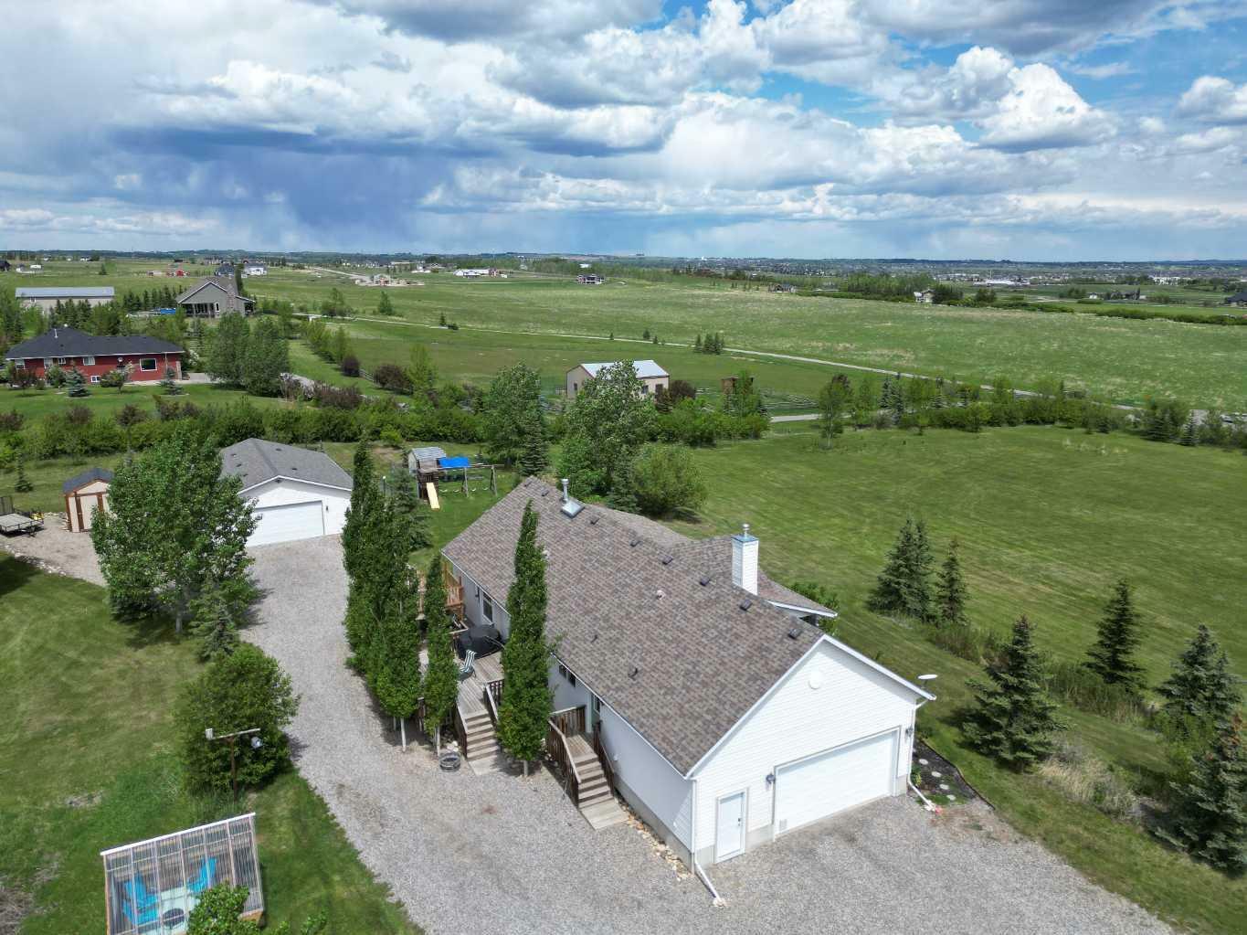 Property Photo: 387217 2 Street W AB T1S 1A1