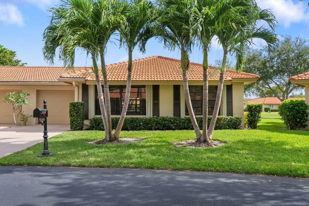 Property Photo: 9850 Bischofia Tree Way B FL 33436