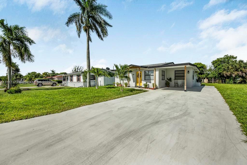Property Photo: 218 SW 10th Ave FL 33444