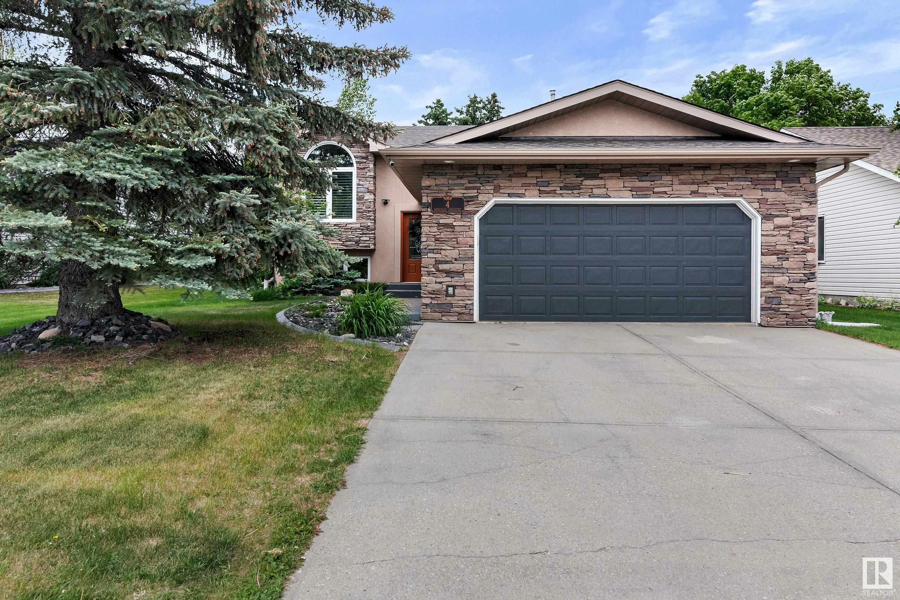 Property Photo: #4 Heritage Crescent AB T7Z 1A1