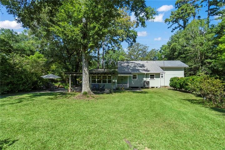 Property Photo:  74140 Military Road  LA 70435 