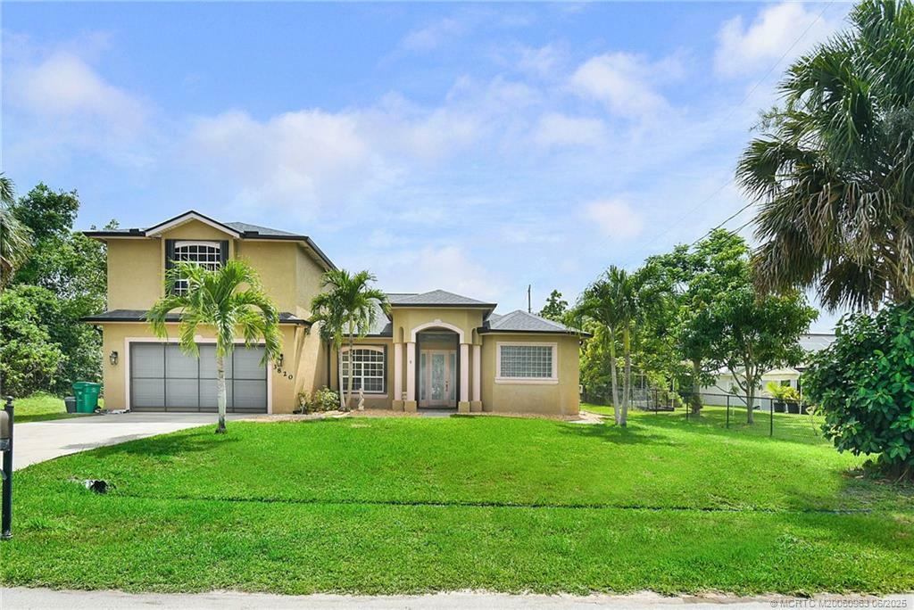 Property Photo: 3820 SW Cheribon Street FL 34953