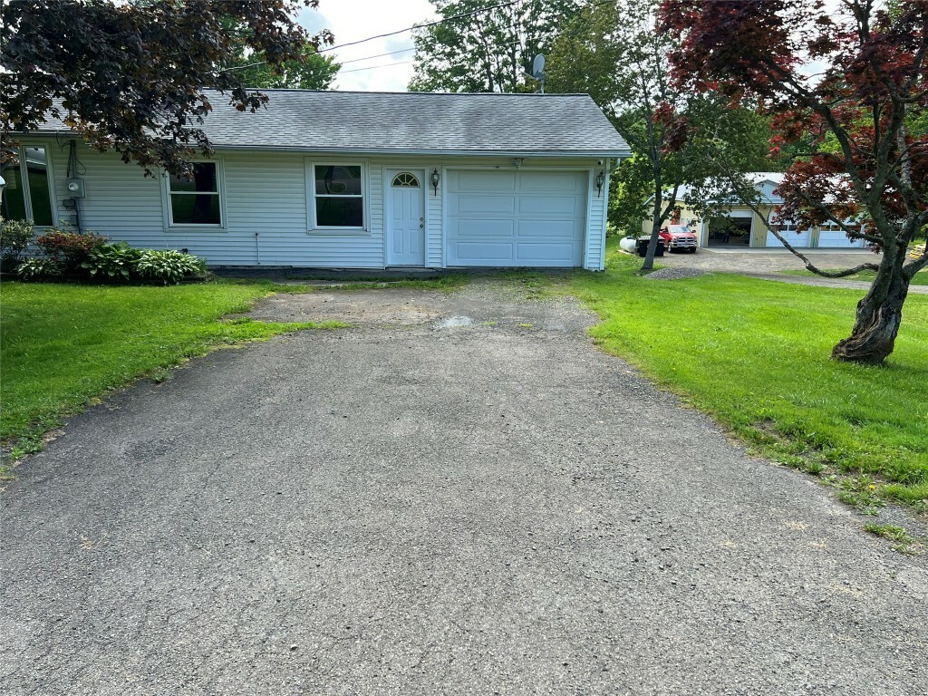 Property Photo: 25 Sanitaria Springs Road NY 13904