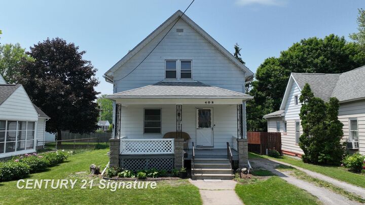 Property Photo:  408 S Alp Street  MI 48706 