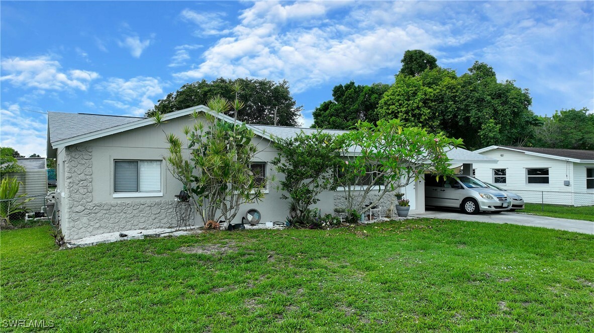Property Photo: 13239 Caribbean Boulevard FL 33905