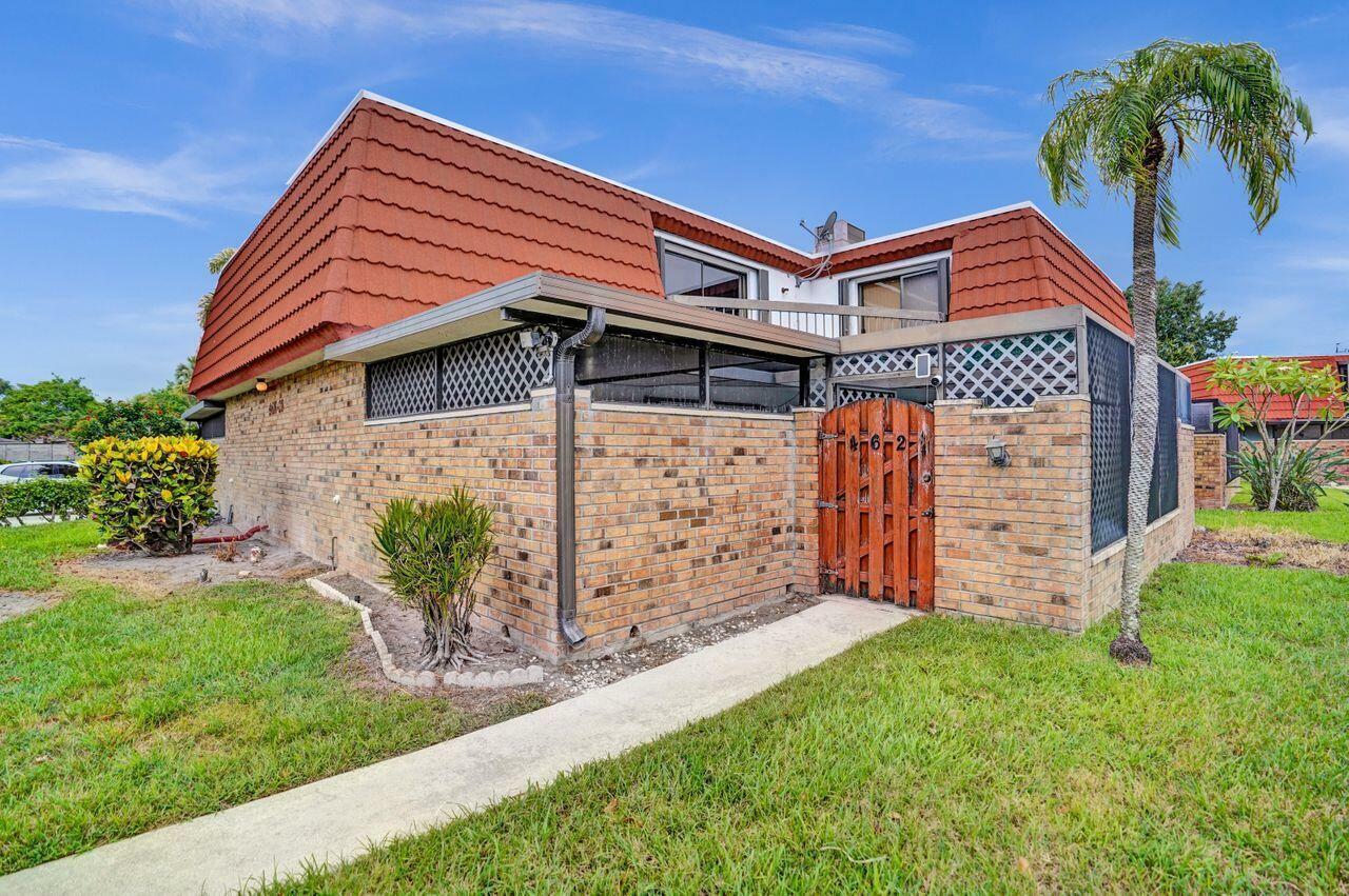 Property Photo: 4628 Suburban Pines Drive FL 33463