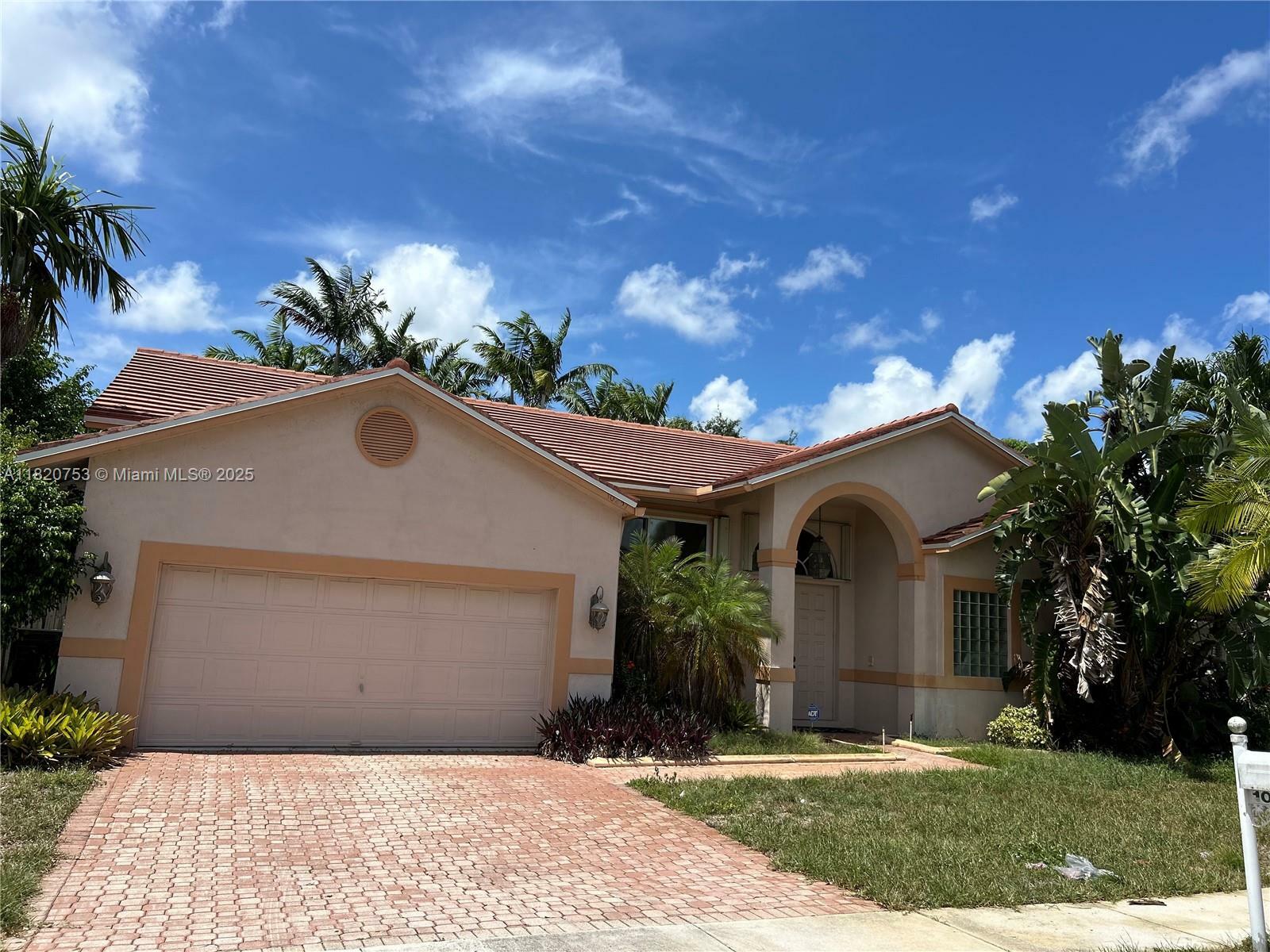 Property Photo:  10257 SW 12th St  FL 33025 