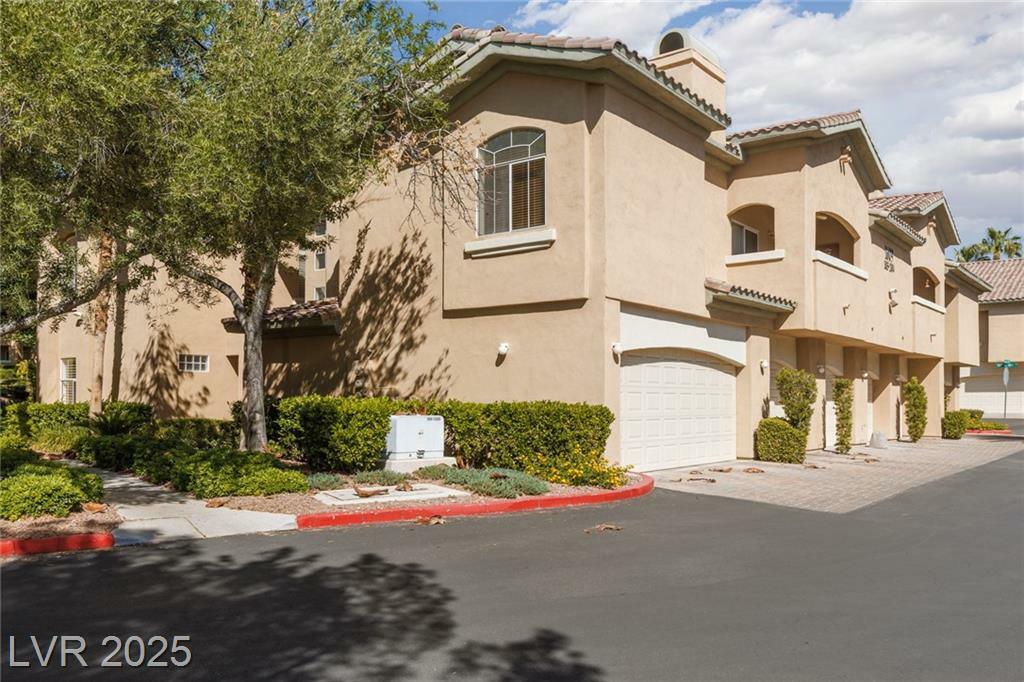Property Photo:  1609 Hills Of Red Drive 104  NV 89128 