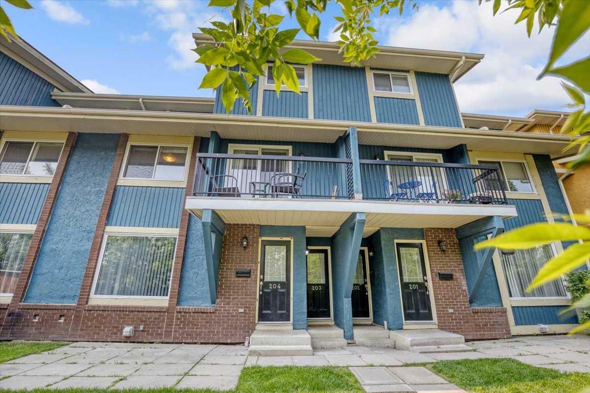 Property Photo: 2200 Woodview Drive SW 203 AB T2W 3N6