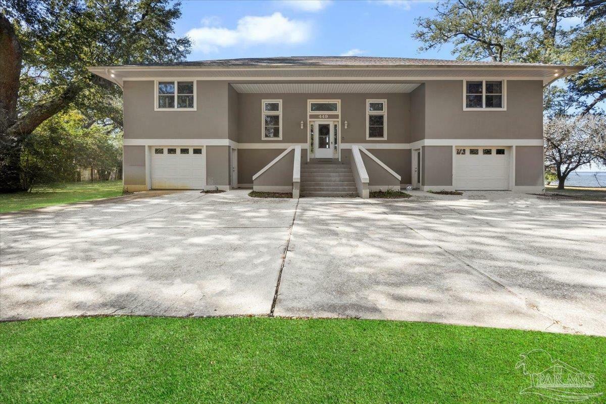 Property Photo: 449 S Garcon Point Rd FL 32583