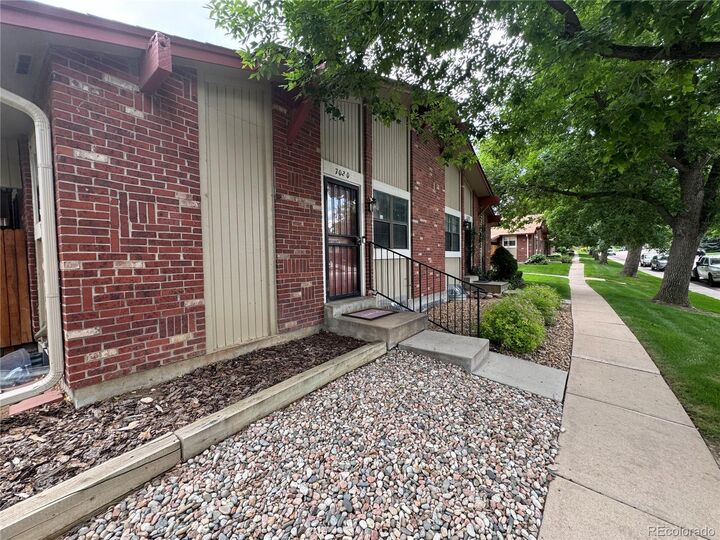Property Photo:  7020 W Portland Avenue  CO 80128 