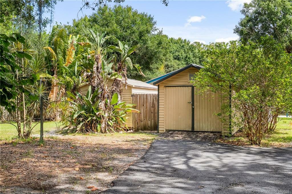 Property Photo: 4800 SW Woodham Street FL 34990