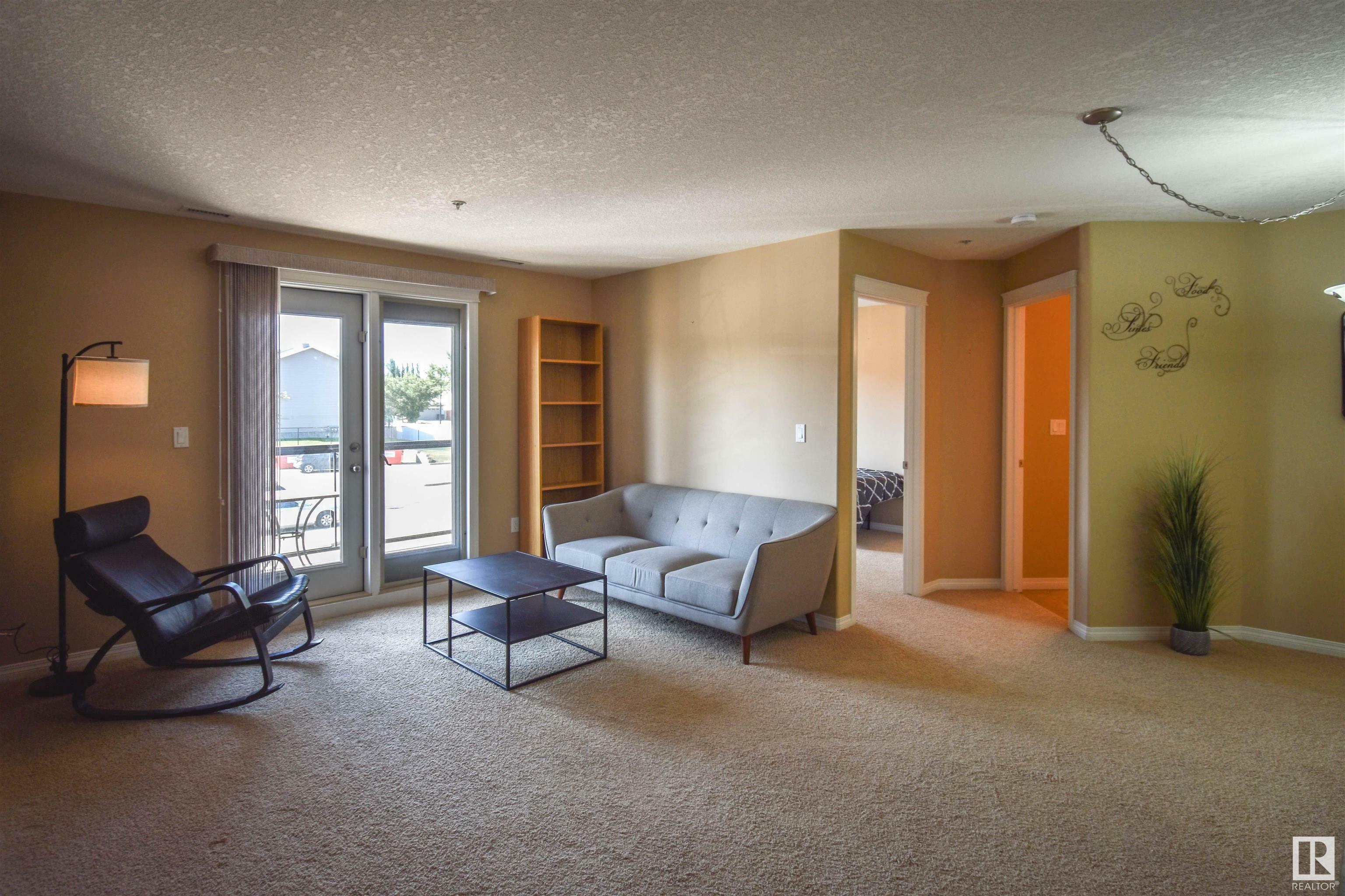 Property Photo: 300 Spruce Ridge Road 204 AB T7X 0H6