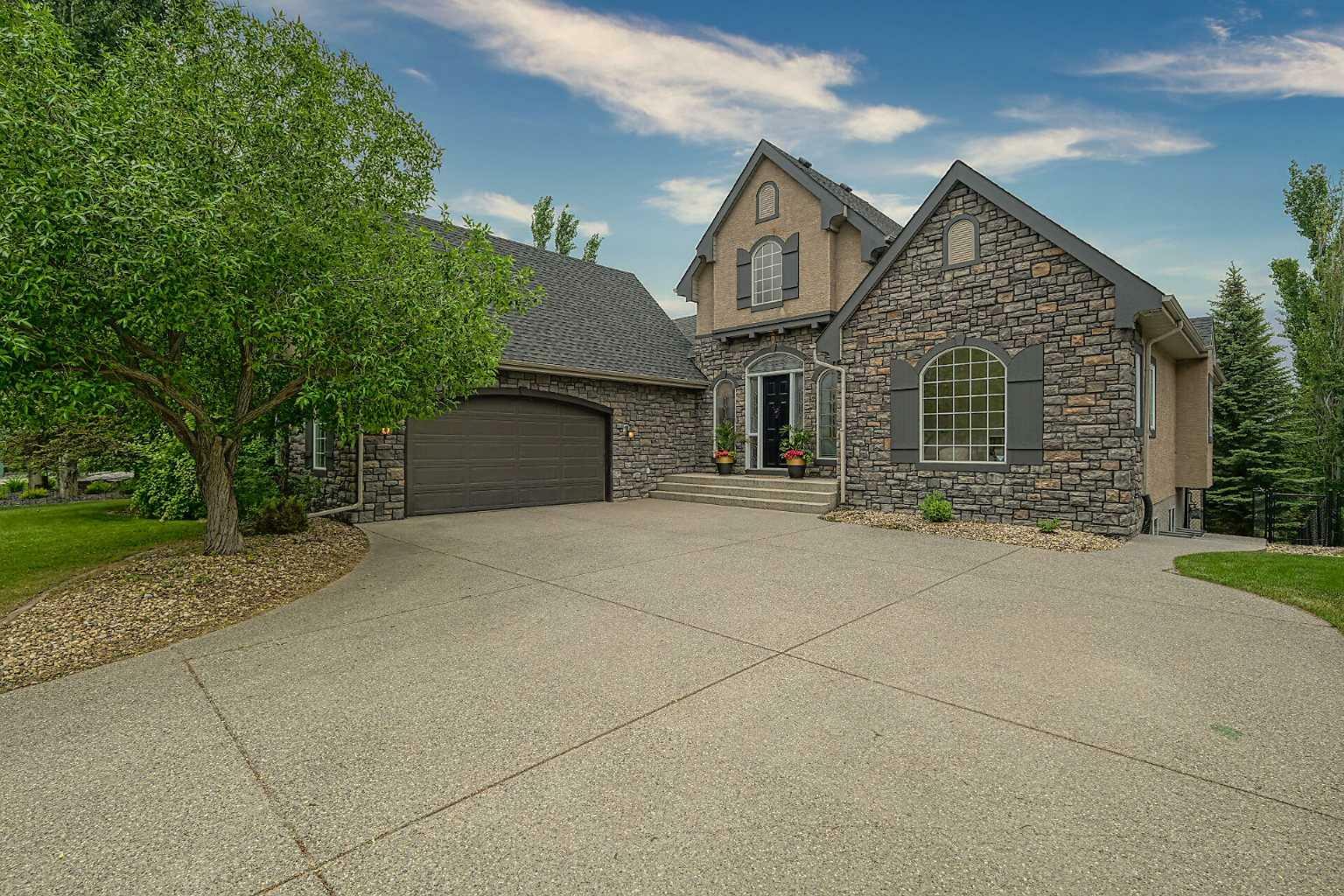 Property Photo: 239 Heritage Lake Drive AB T1S 4H9