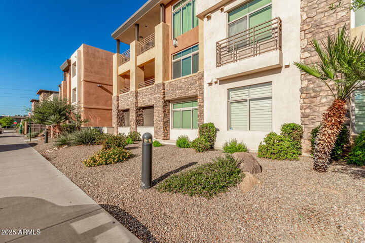 Property Photo: 4909 N Woodmere Fairway -- 1004 AZ 85251
