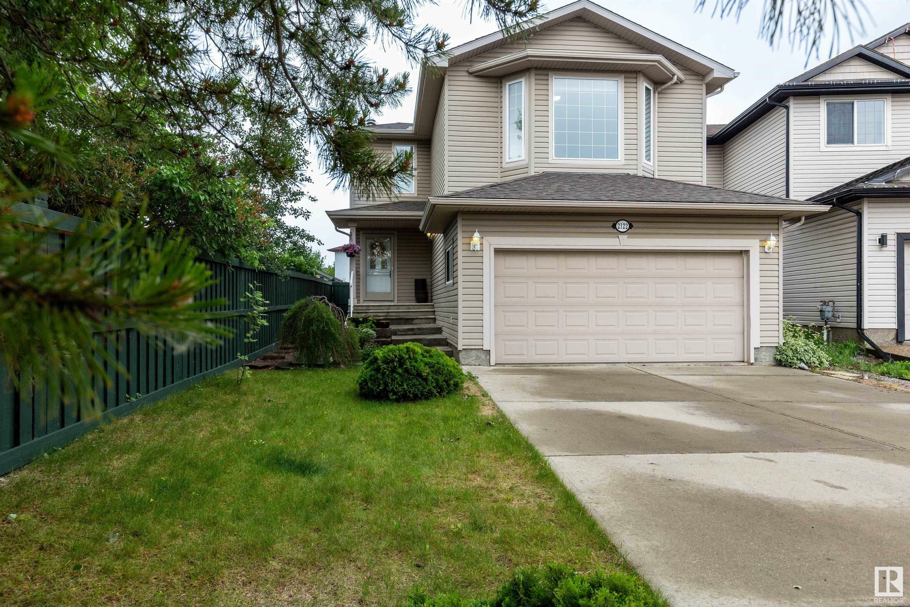 Property Photo: 2122 Garnett Place NW AB T5T 6R5
