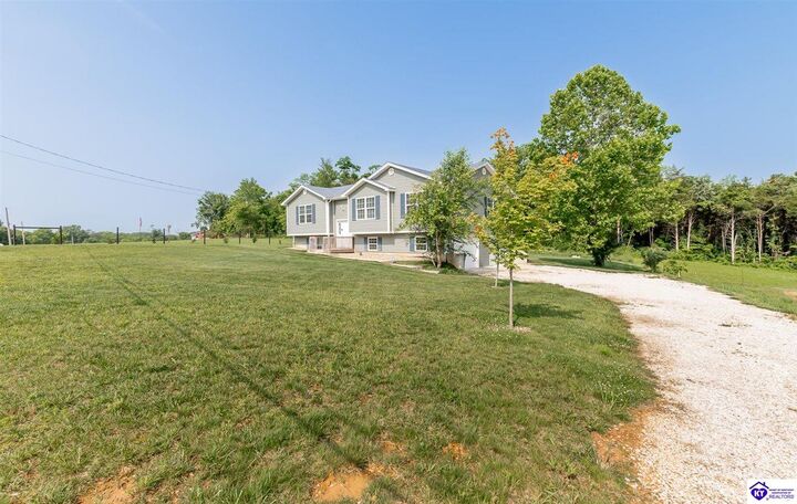 Property Photo:  303 Charlie Pile Road  KY 40142 