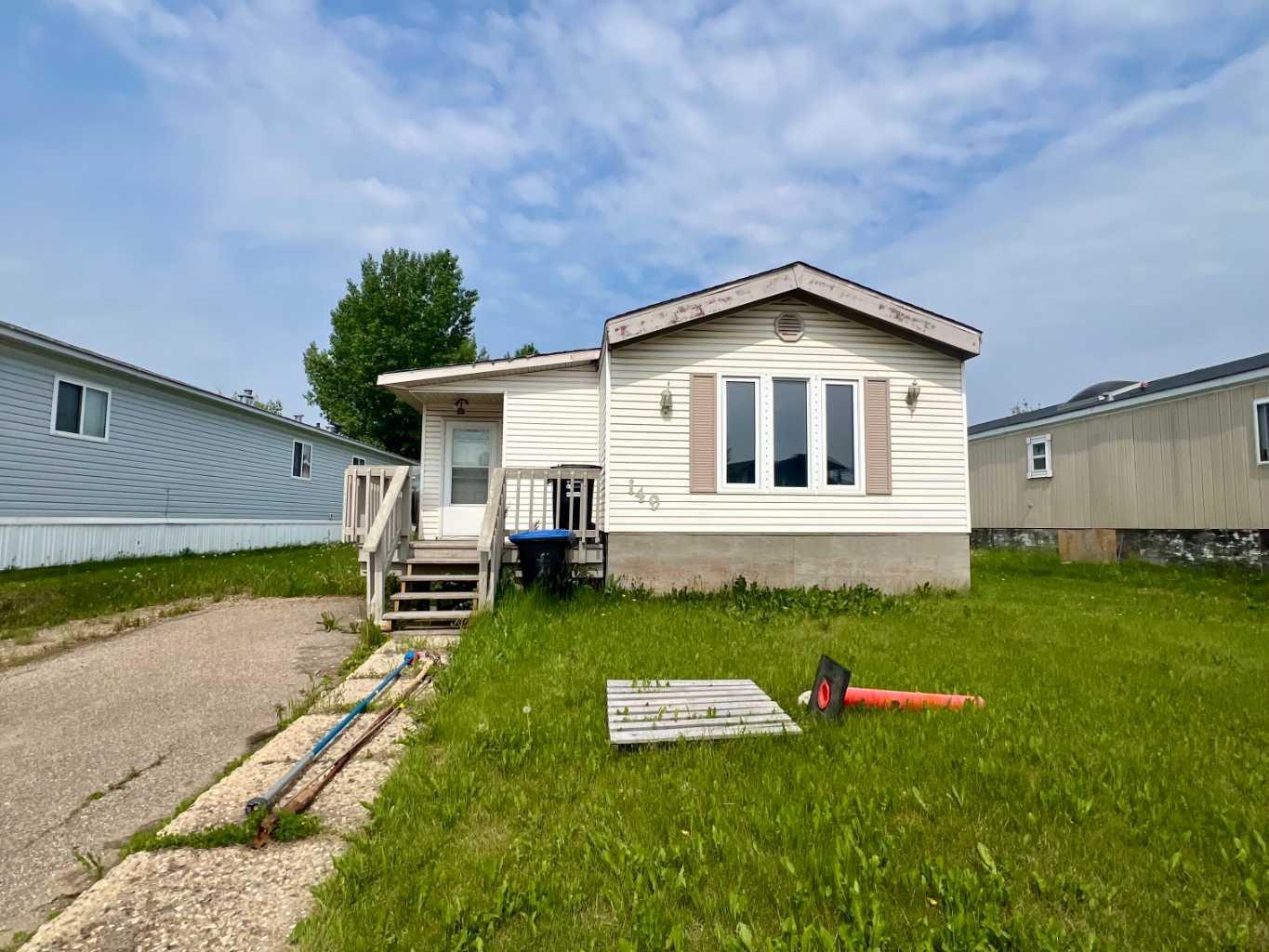 Property Photo: 149 Clausen Crescent AB T9K 2H8