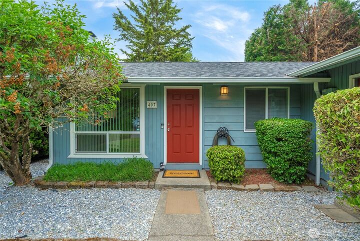 Property Photo:  407 E 78th Street  WA 98404 