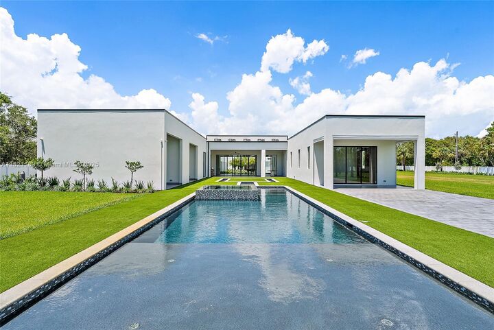 Property Photo:  9741 SE Gomez Ave  FL 33455