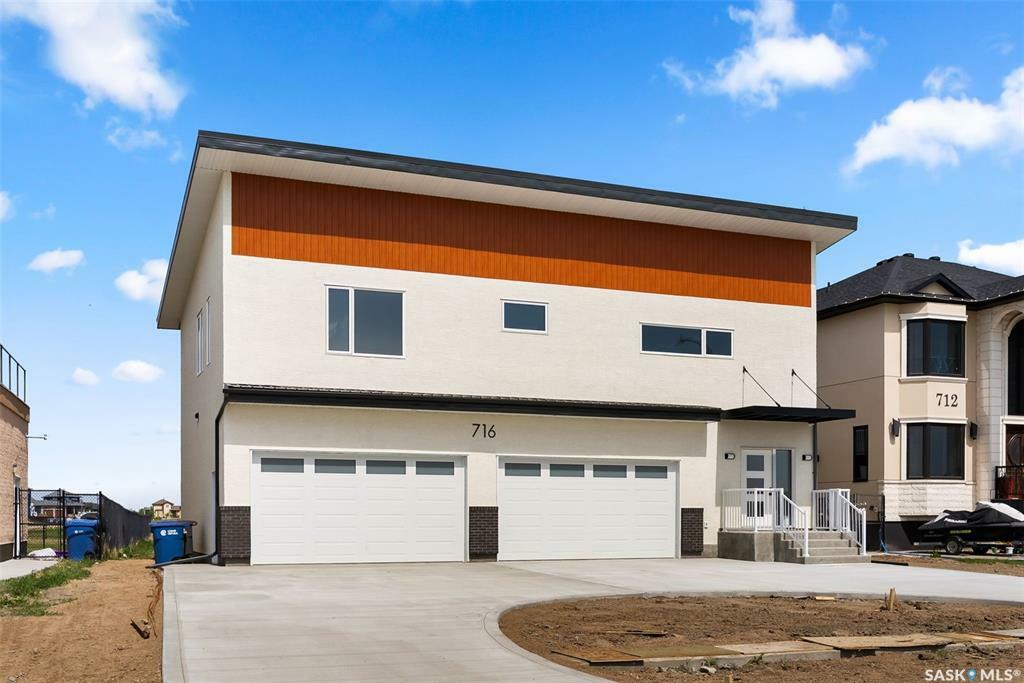 Property Photo: 716 Emerald Park Road SK S4L 0C4