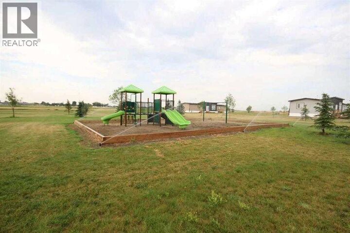 Property Photo:  5 Meadows Way  AB T1G 2A2 