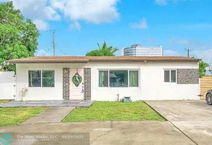 Property Photo: 561 NE 61st St FL 33334
