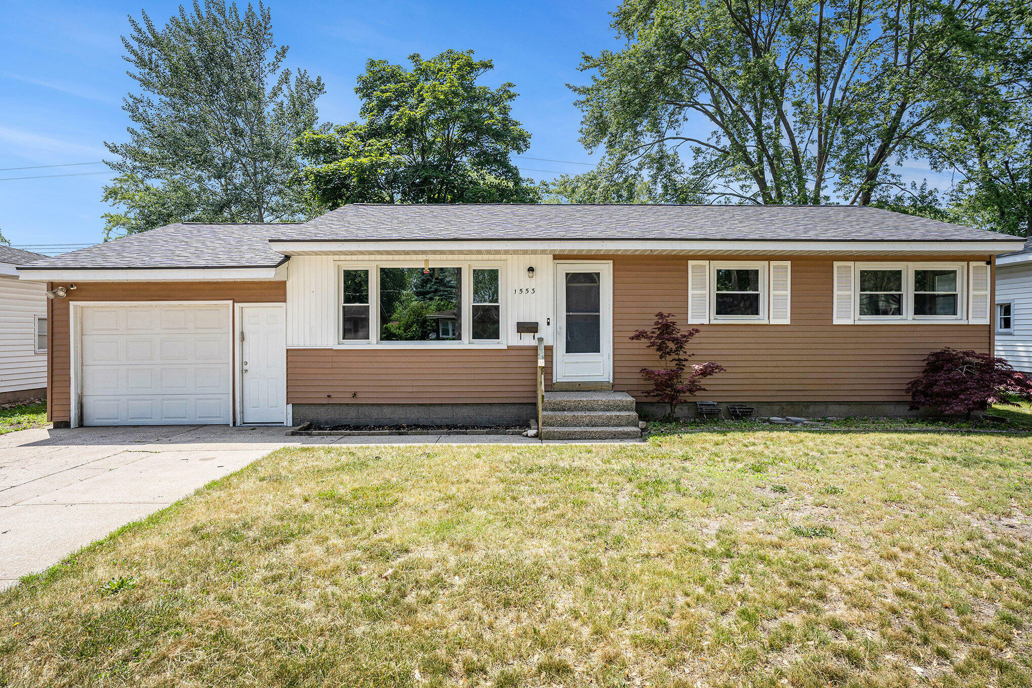 Property Photo: 1553 Greenwich Road MI 49441