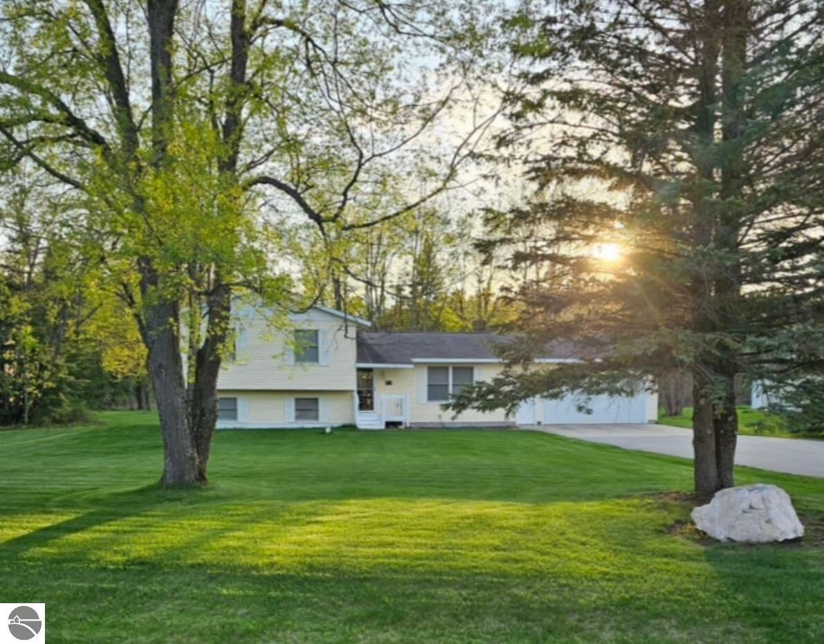 Property Photo:  3730 Driftwood Drive  MI 49601 