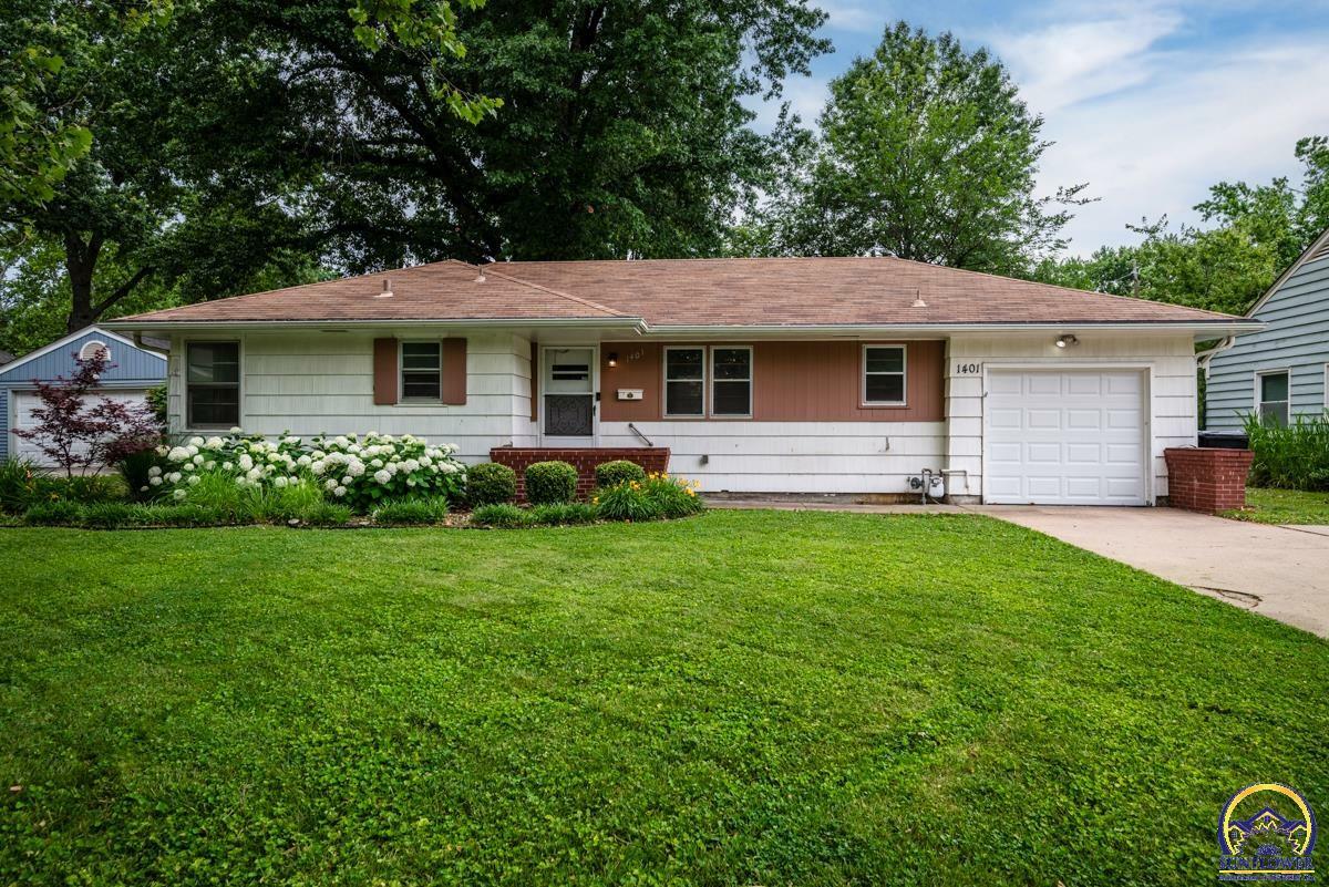 Property Photo: 1401 SW Burnett Rd KS 66604