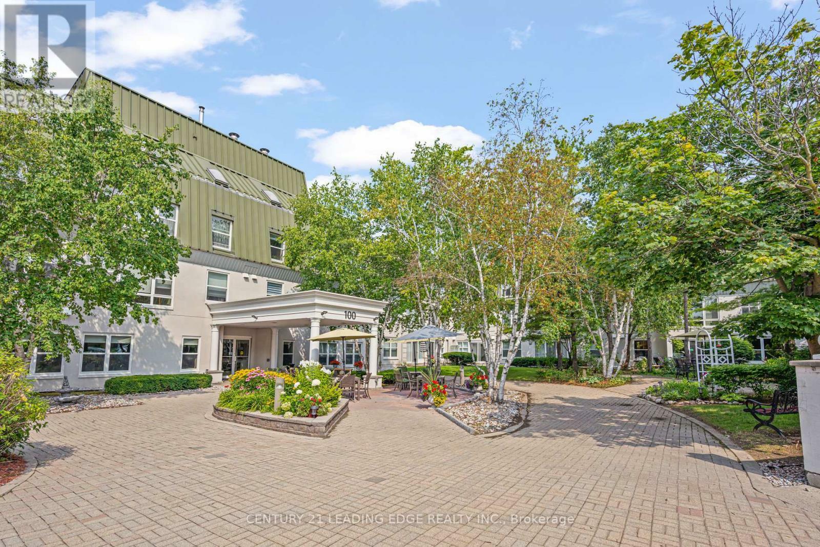 Property Photo: 100 Anna Russell Way 120 ON L3R 6C7