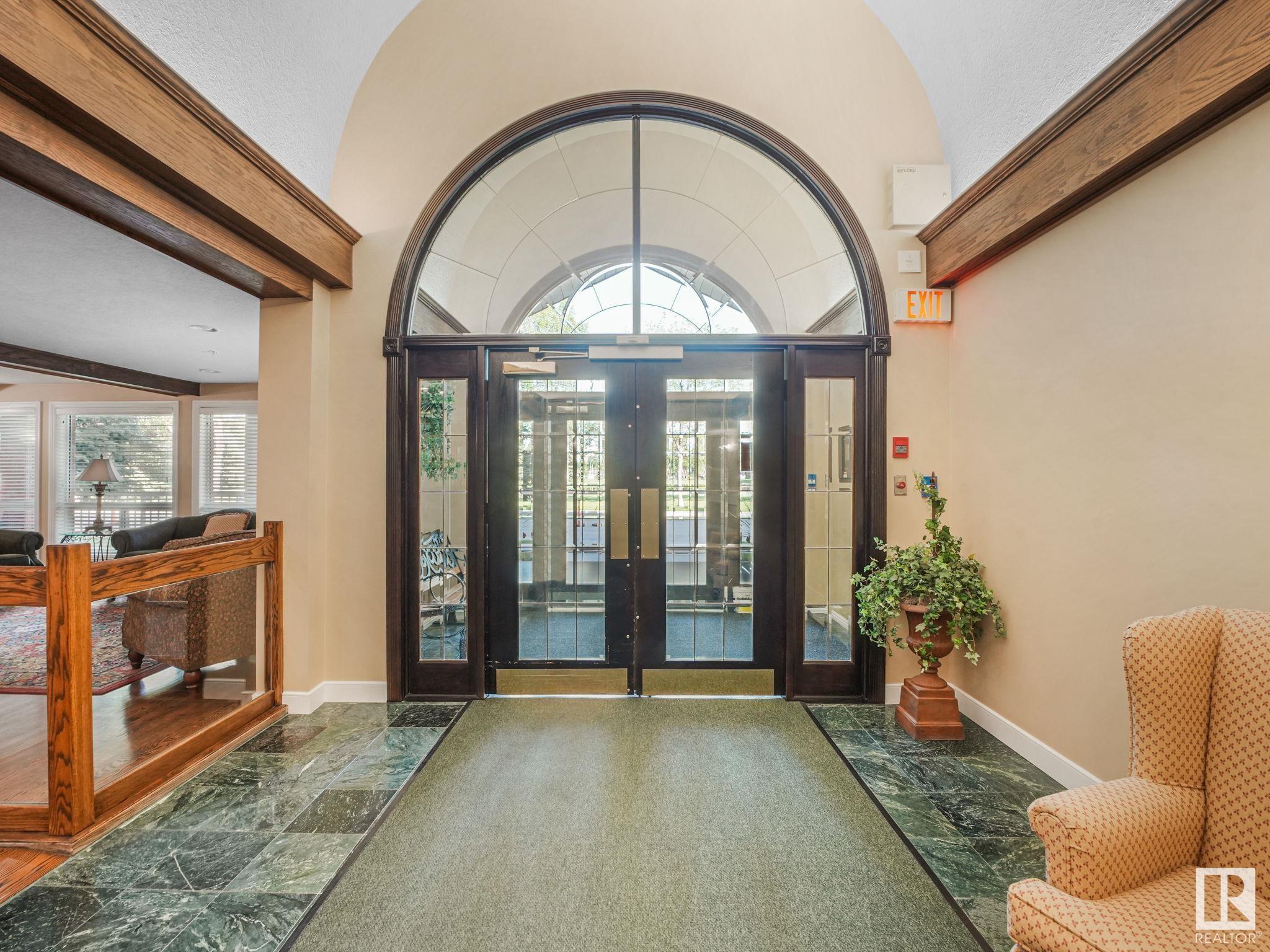 Property Photo:  6220 Fulton Road NW 211  AB T6A 3T4 