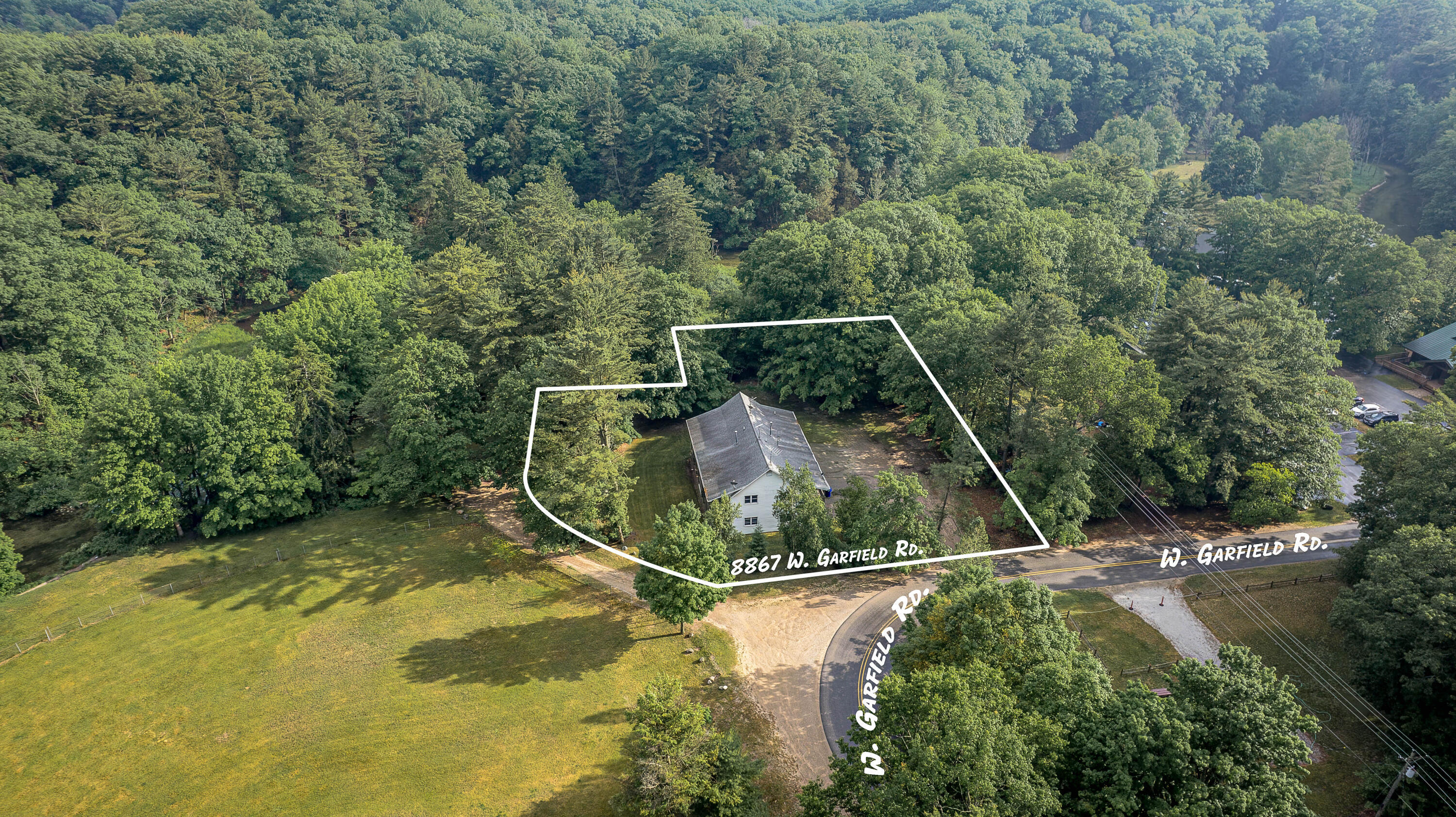 Property Photo:  8867 W Garfield Road  MI 49455 