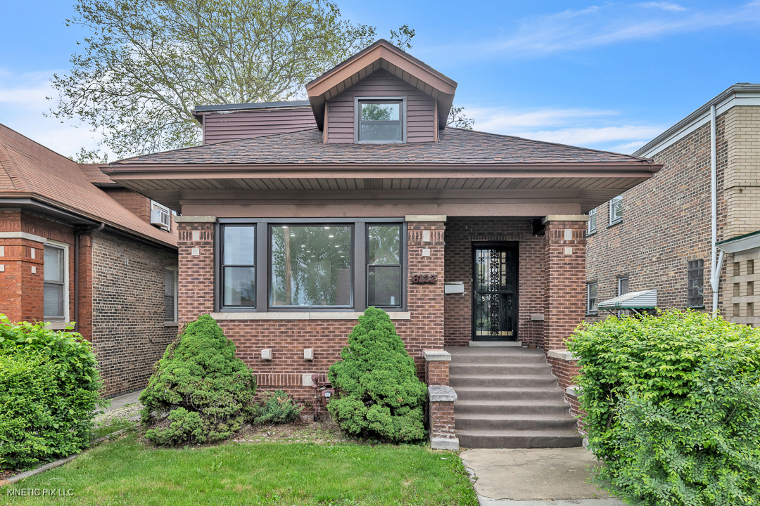 Property Photo:  8127 S Jeffery Boulevard  IL 60617 