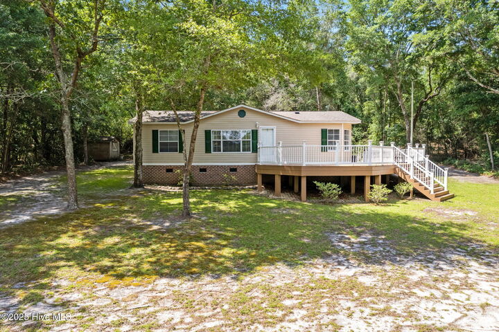 Property Photo:  930 Cypress Lakes Circle SE  NC 28422