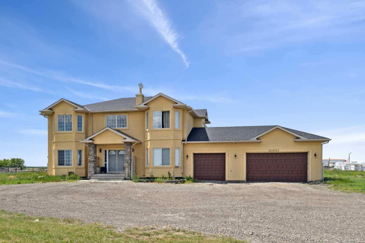 Property Photo: 251203 Sunshine Road AB T1Z 0M6