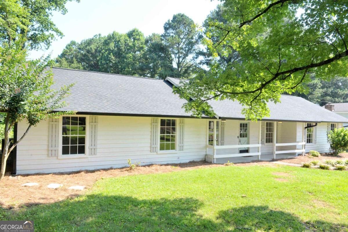 Property Photo: 5974 SW Four Winds Drive GA 30047