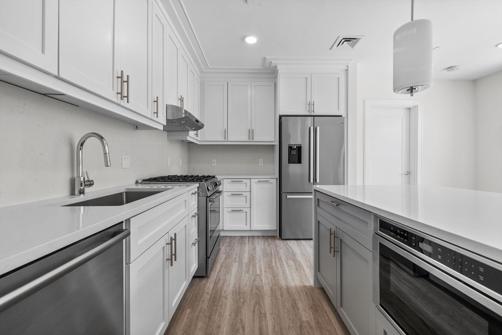 Property Photo:  301 Border Street 211  MA 02128 