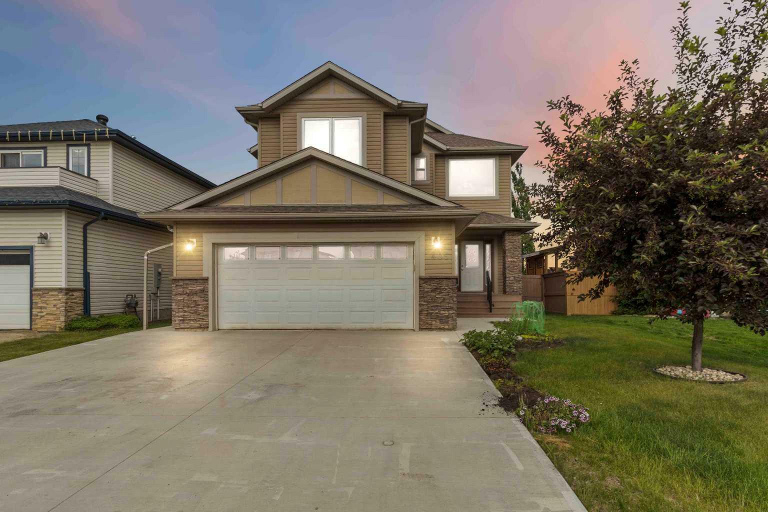 Property Photo: 405 Loutit Road AB T9K 0S3